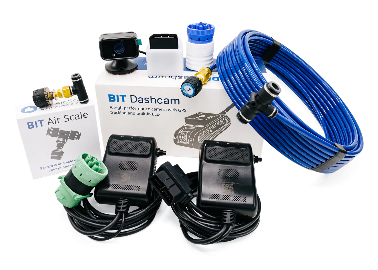 Every BIT device on one table: two Dashcam ELDs and the driver camera, the BIT ELD in OBD-II and 9-pin, and the Air Scale set