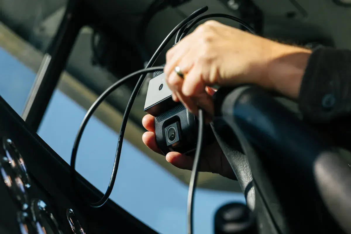 Installing the BIT Dashcam at the windshield of a truck cab