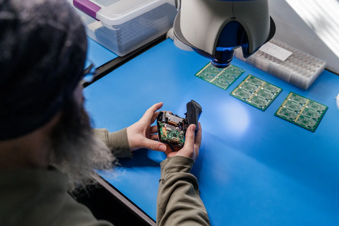 Blue Ink Tech boards being assembled by hand